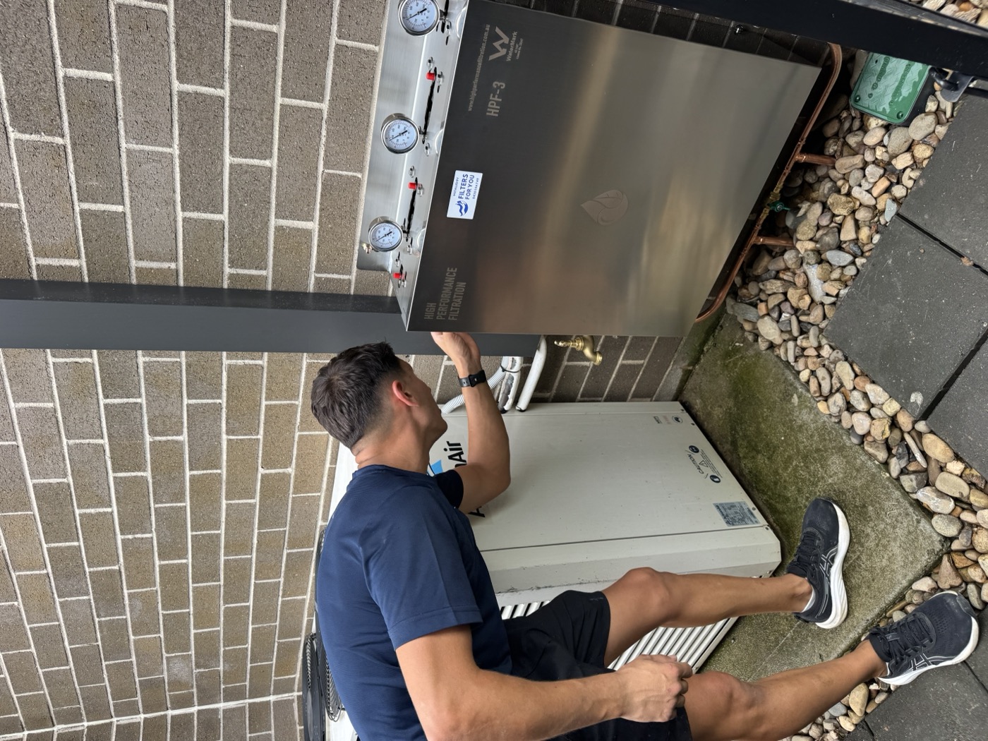 Reverse osmosis water filter system installed under sink Sydney home